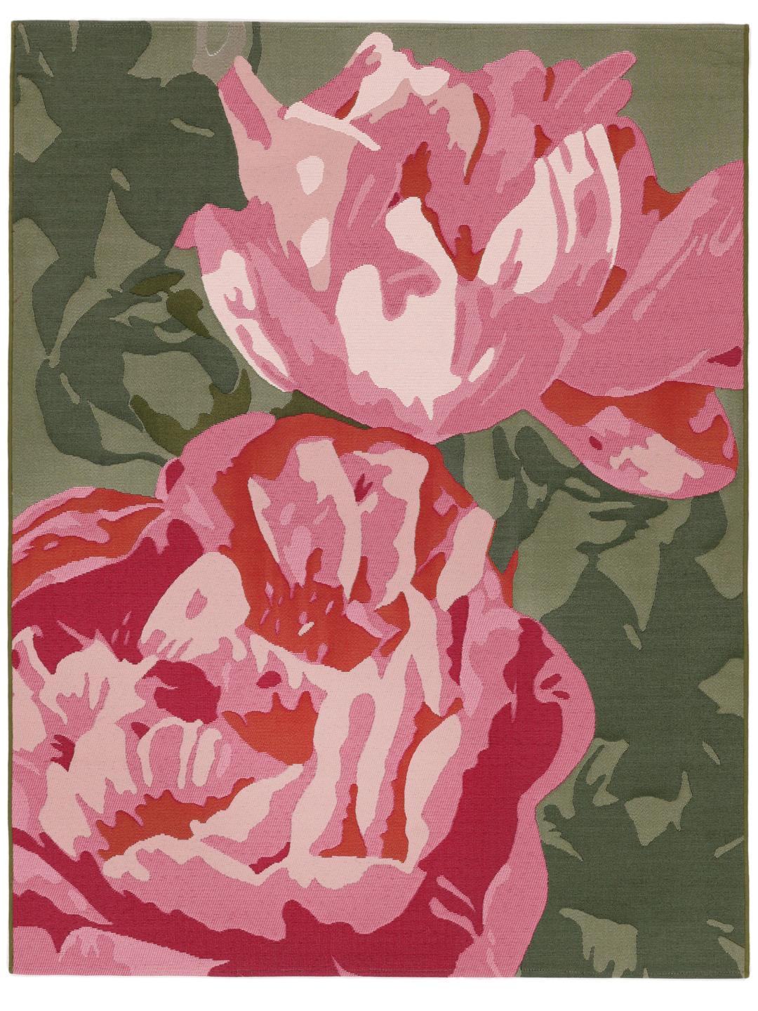 Pink and green rug with large floral pattern