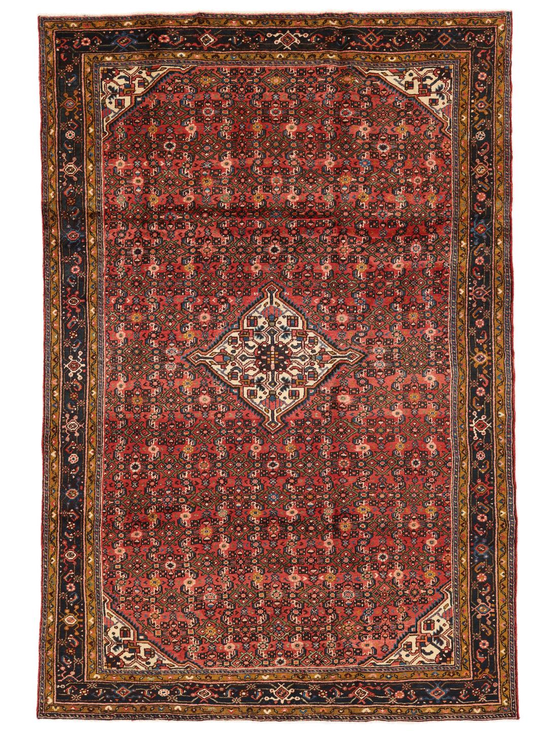 Hand-knotted Hosseinabad Wool rug from the Middle East in deep red