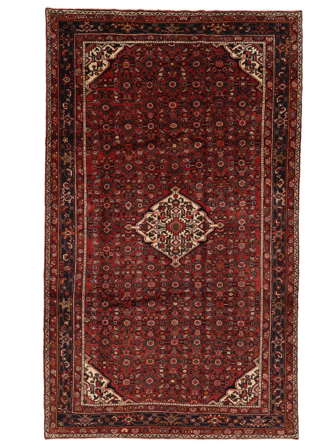 Hand-knotted Hosseinabad rug from the Middle East in deep red and dark blue tones.