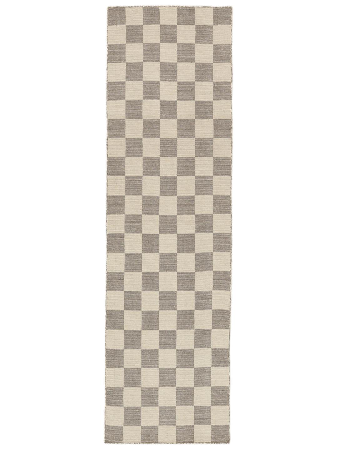 Et gråt og beige ternet løbertæppe
