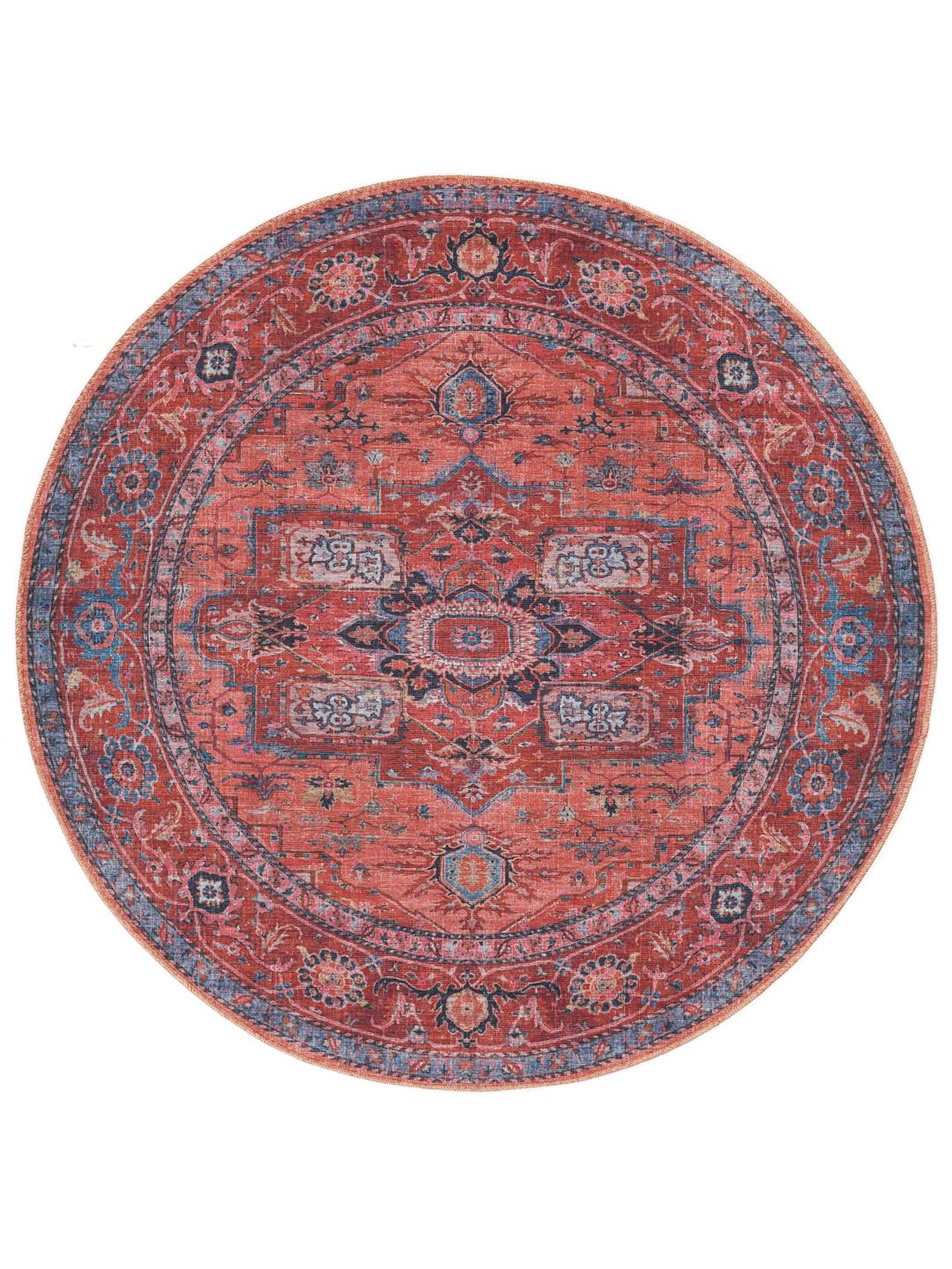 Tapis rond en rouge et bleu avec des motifs de médaillons traditionnels