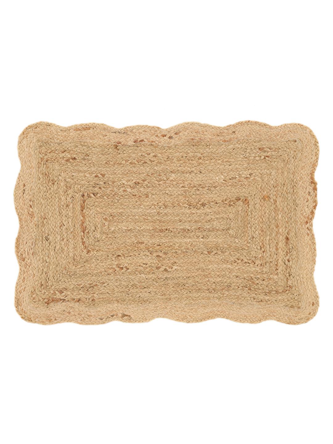 Beige vloerkleed met een golvende rand
