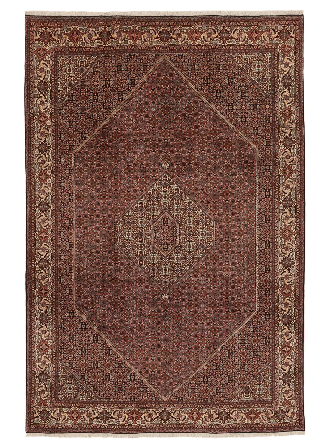A hand-knotted Bidjar rug from the Middle East with a dark-red field and intricate medallion pattern.