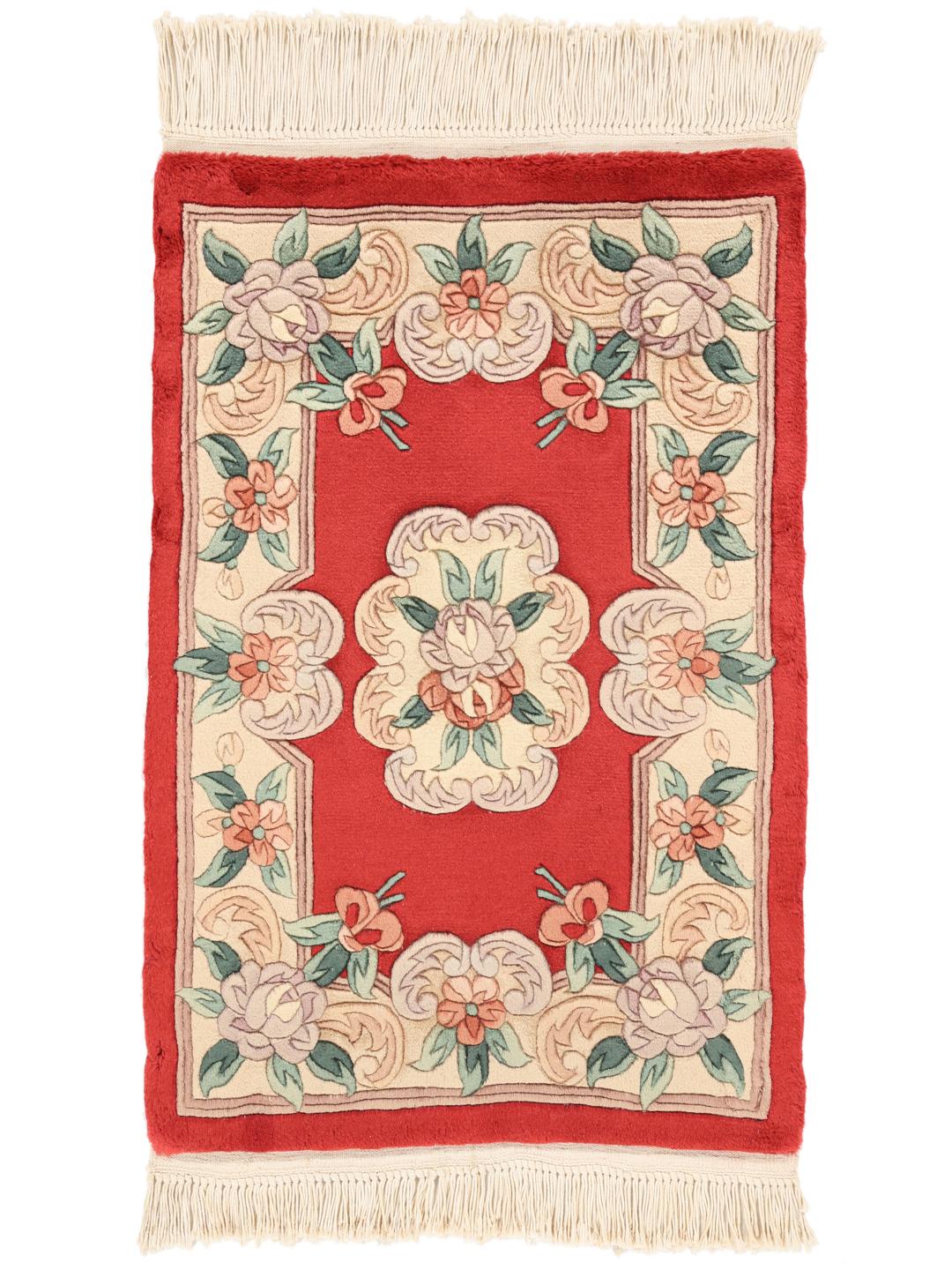 Hand-knotted Chinese rug with a red floral pattern