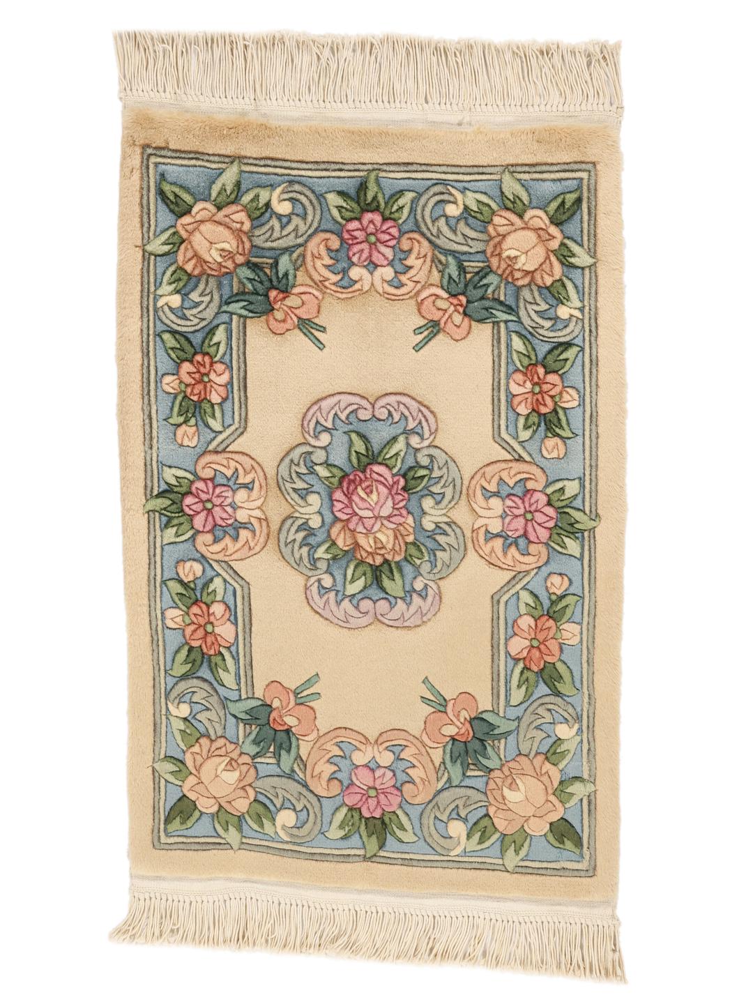 Hand-knotted floral rug from China in beige and soft blue tones