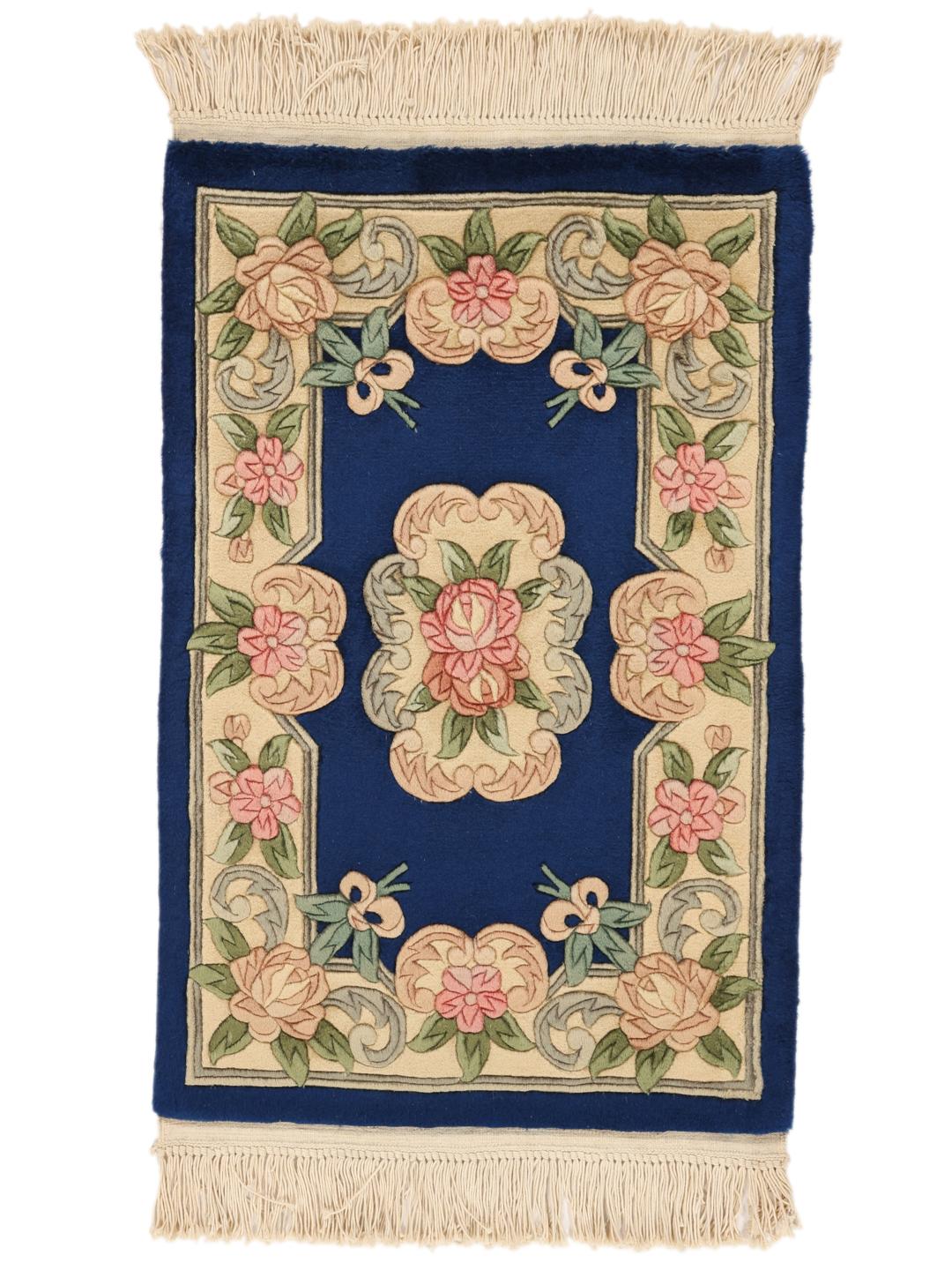 Hand-knotted Chinese rug with floral motifs on a blue and cream background