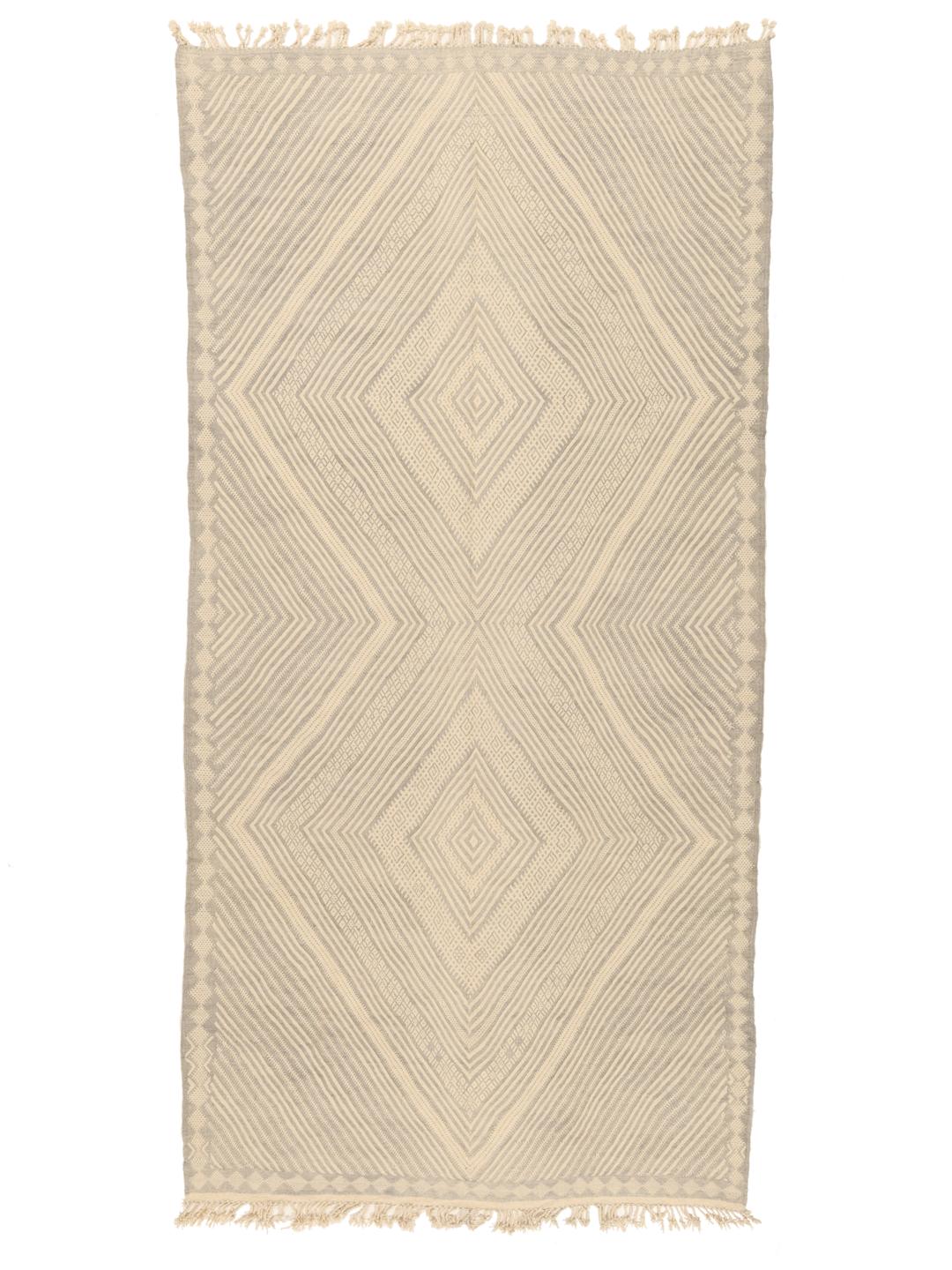 Hand-woven Moroccan rug with diamond patterns in beige and grey