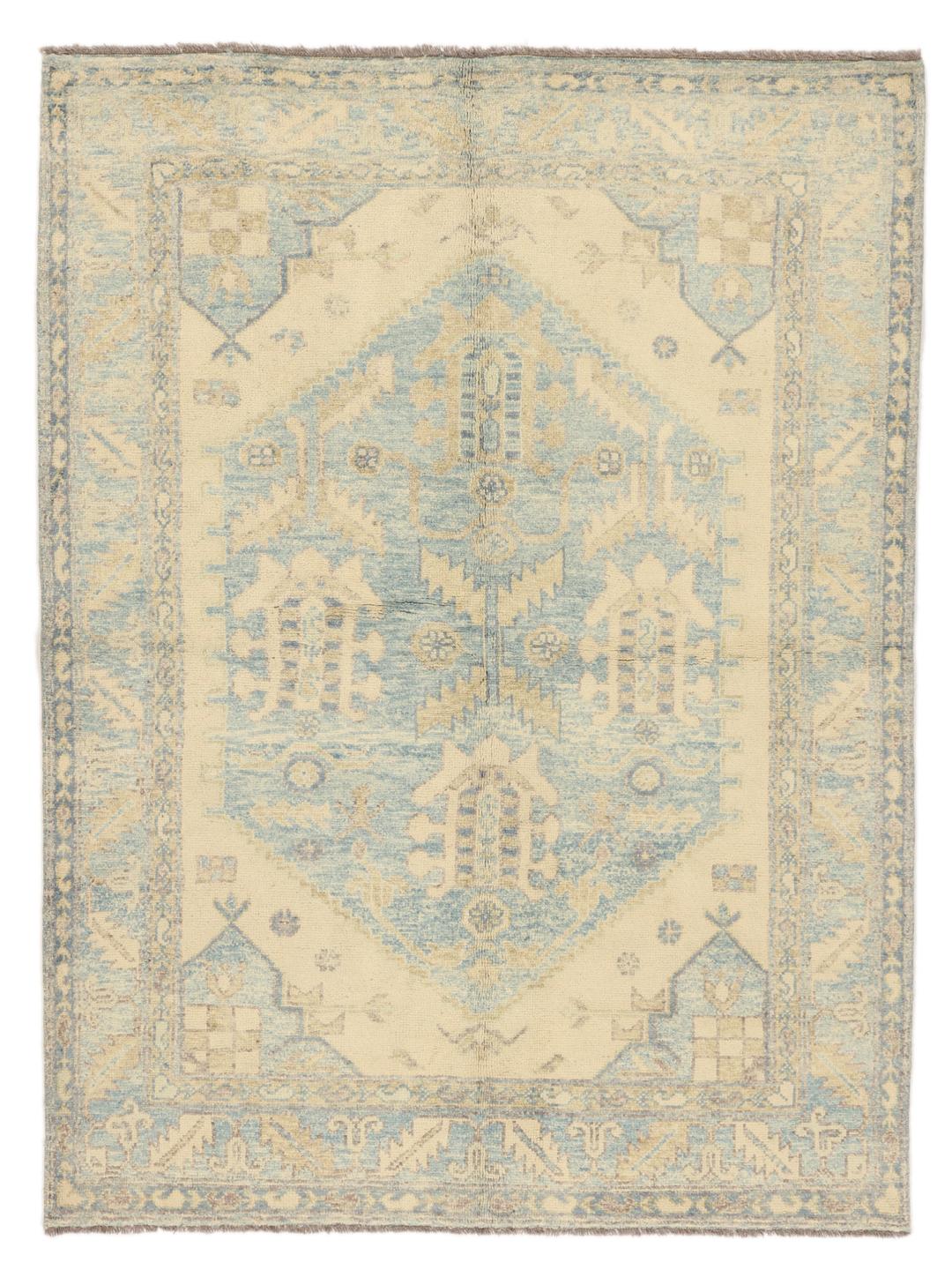 Handgeknoopt Afghaans tapijt met een blauw en beige medaillonpatroon