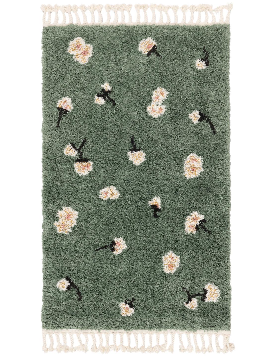 groen tapijt met bloemmotieven en franjes