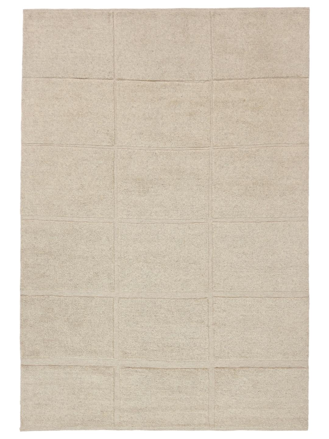 Beige tapijt met details in hoge en lage pool