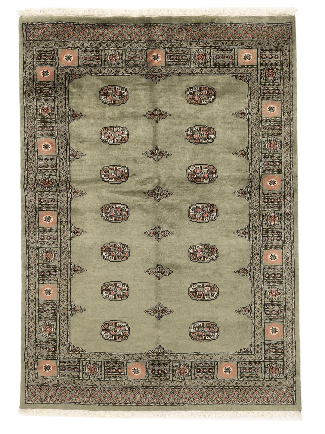 A hand-knotted green Pakistan Bokhara rug with traditional repeating motifs.
