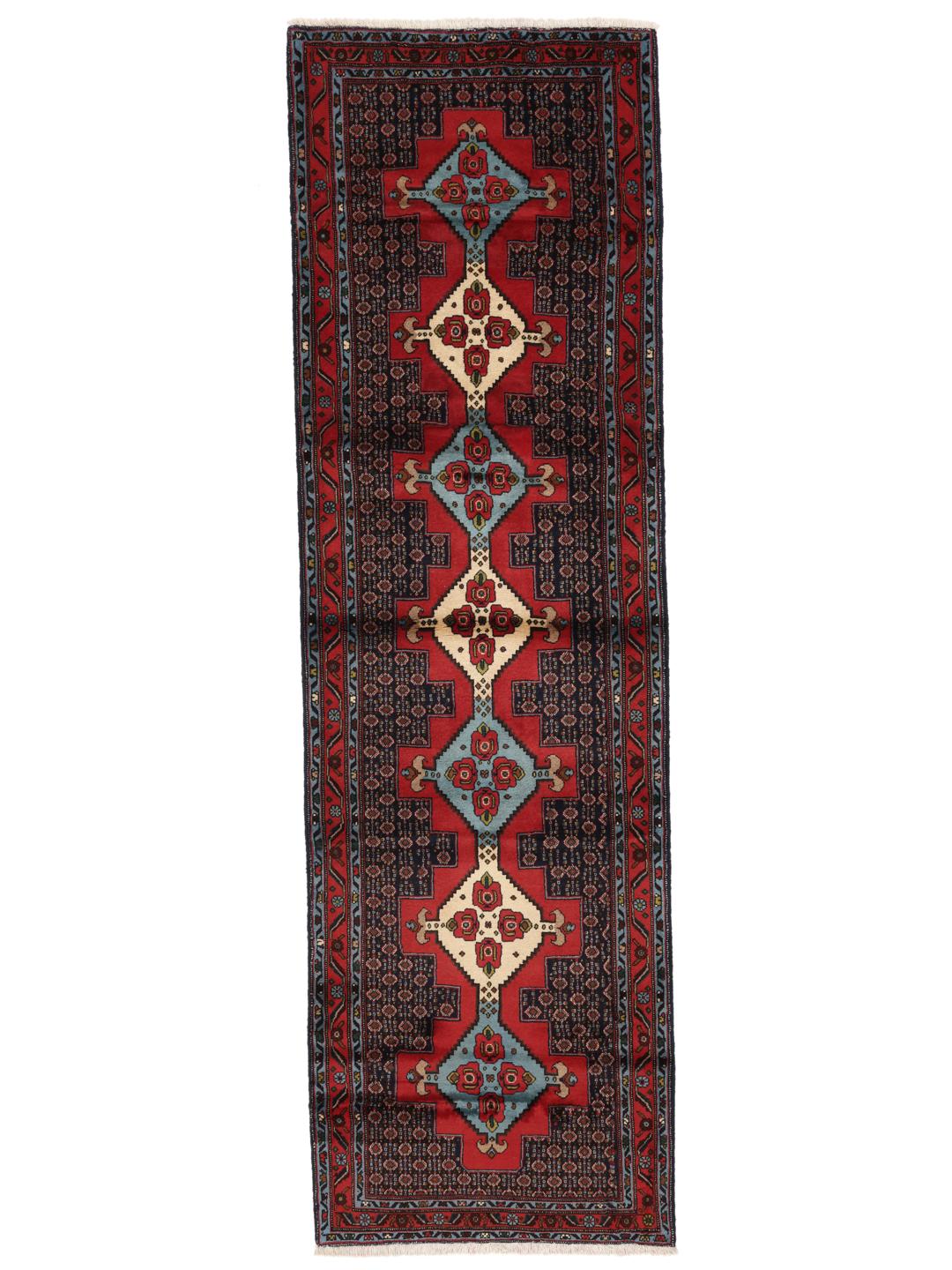 Hand-knotted Senneh runner with a red field and decorative medallion pattern