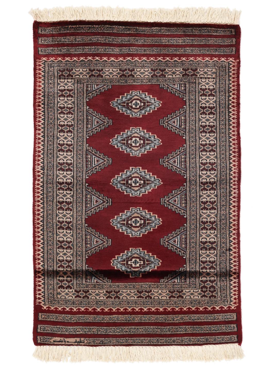 A hand-knotted red Pakistan Bokhara 3ply rug with geometric motifs.