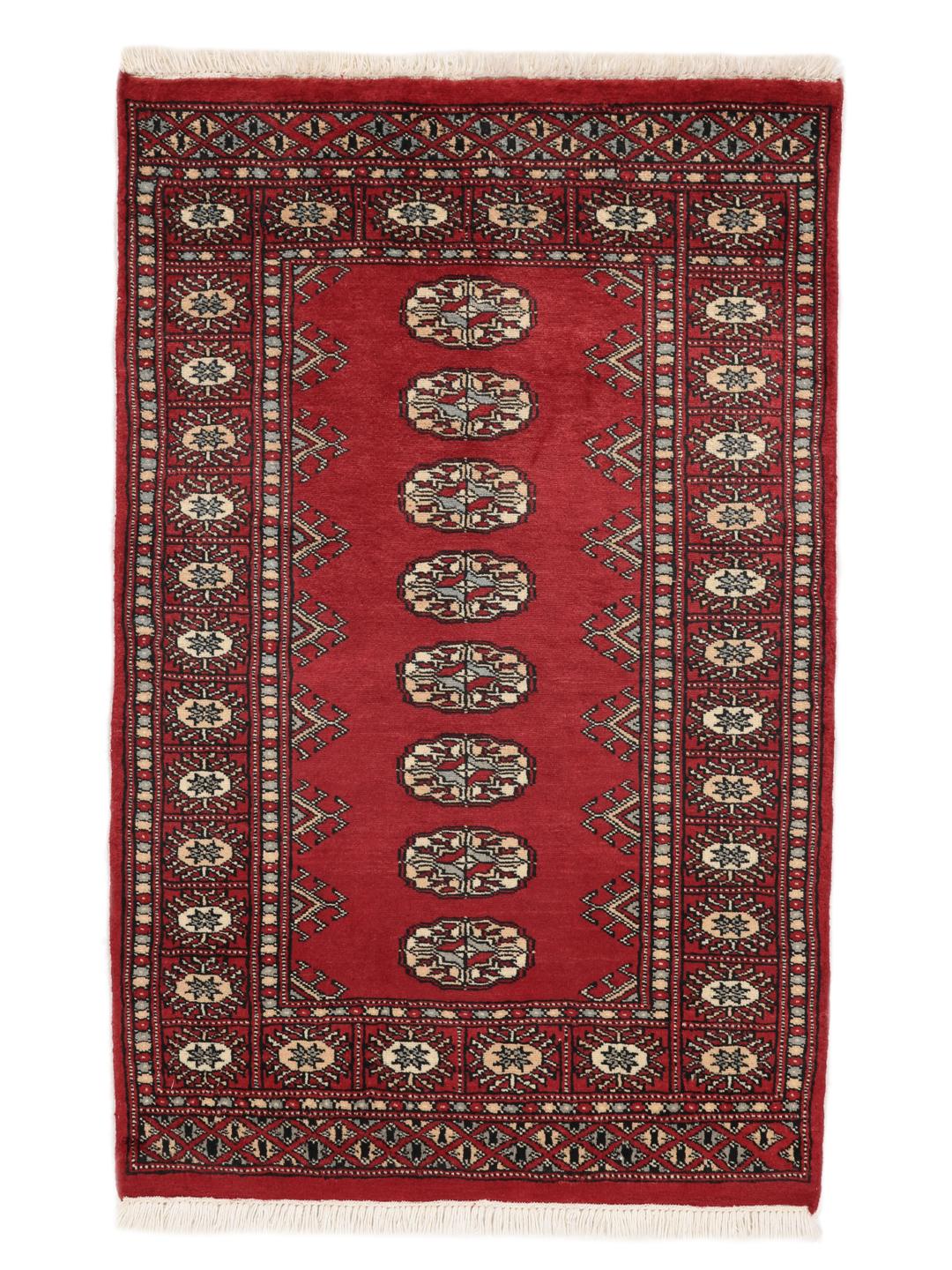 A hand-knotted Pakistan Bokhara rug with a dark-red field and classic repeating motifs.