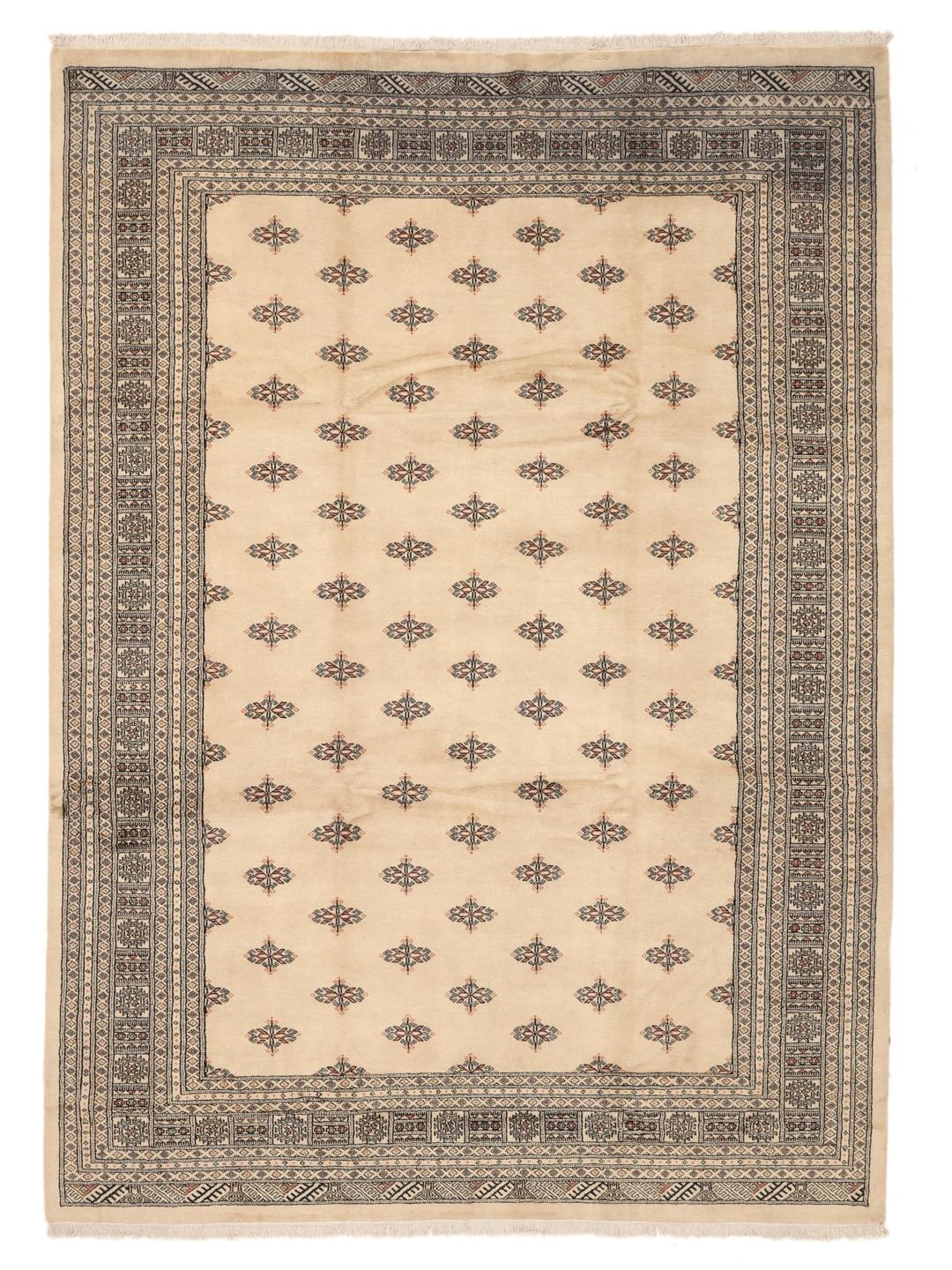 Hand-knotted Pakistan Bokhara rug with a beige field and traditional motifs