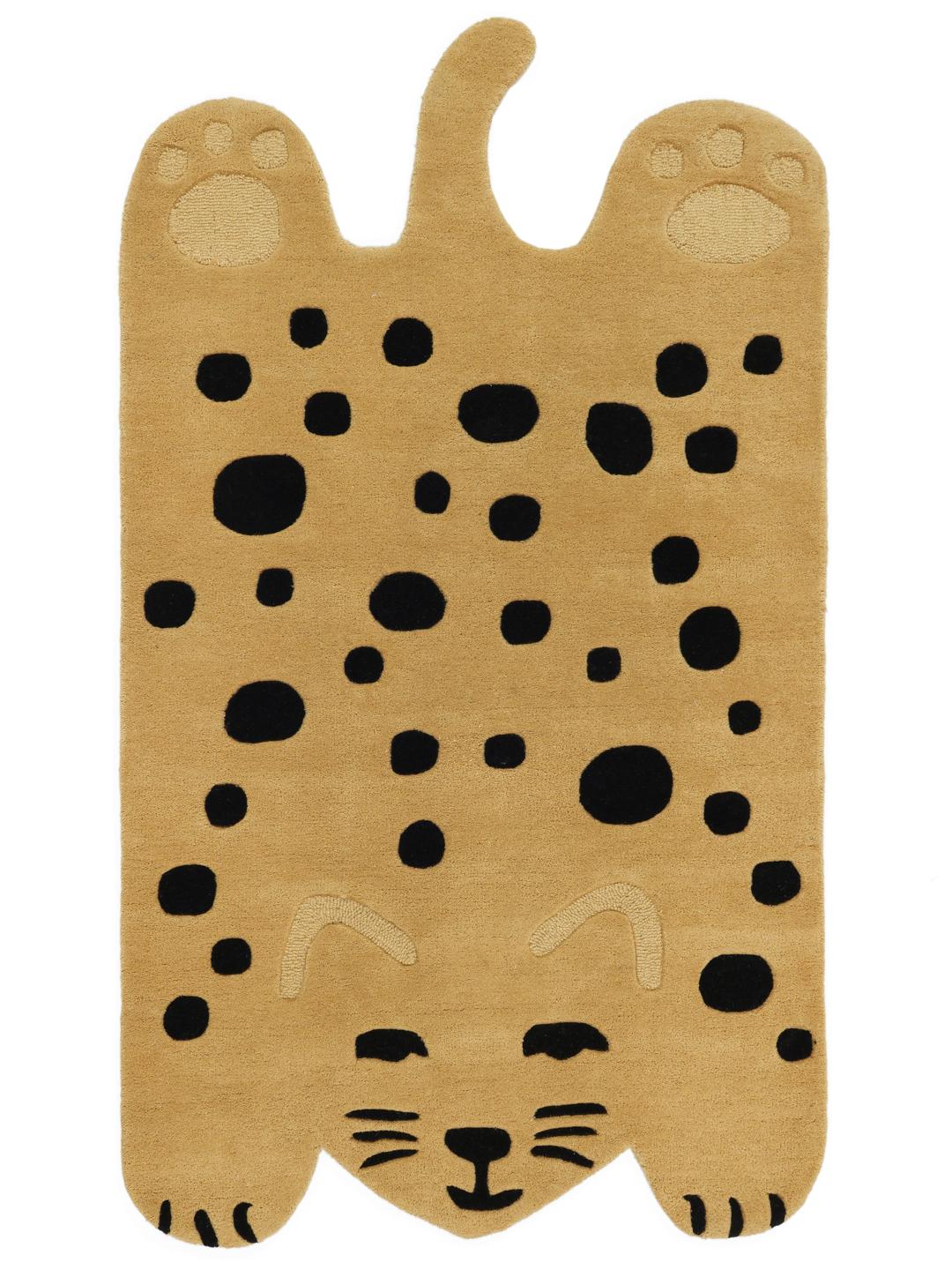 Un tapis ludique en forme de chat dans des tons jaune foncé et noir