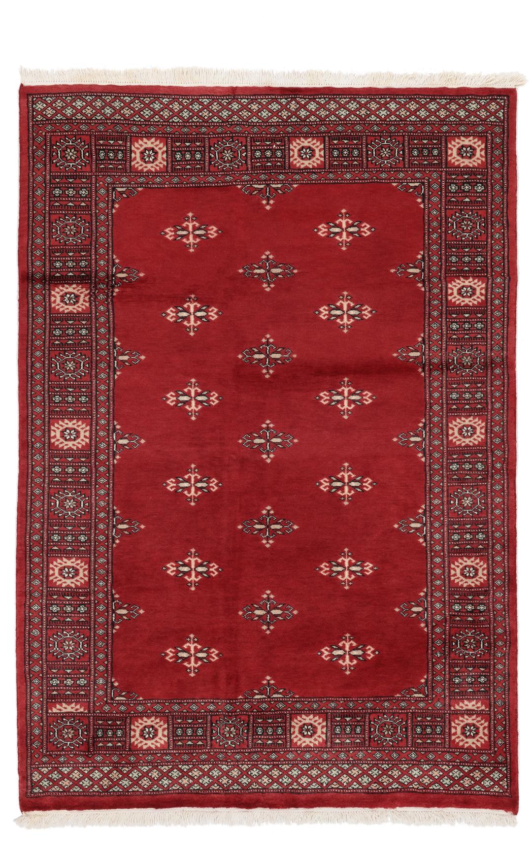 Hand-knotted Pakistan Bokhara rug with a deep red field and traditional motifs.