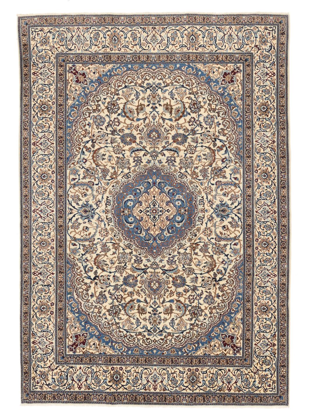 A rectangular Nain rug from the Middle East featuring a floral pattern in beige and blue.