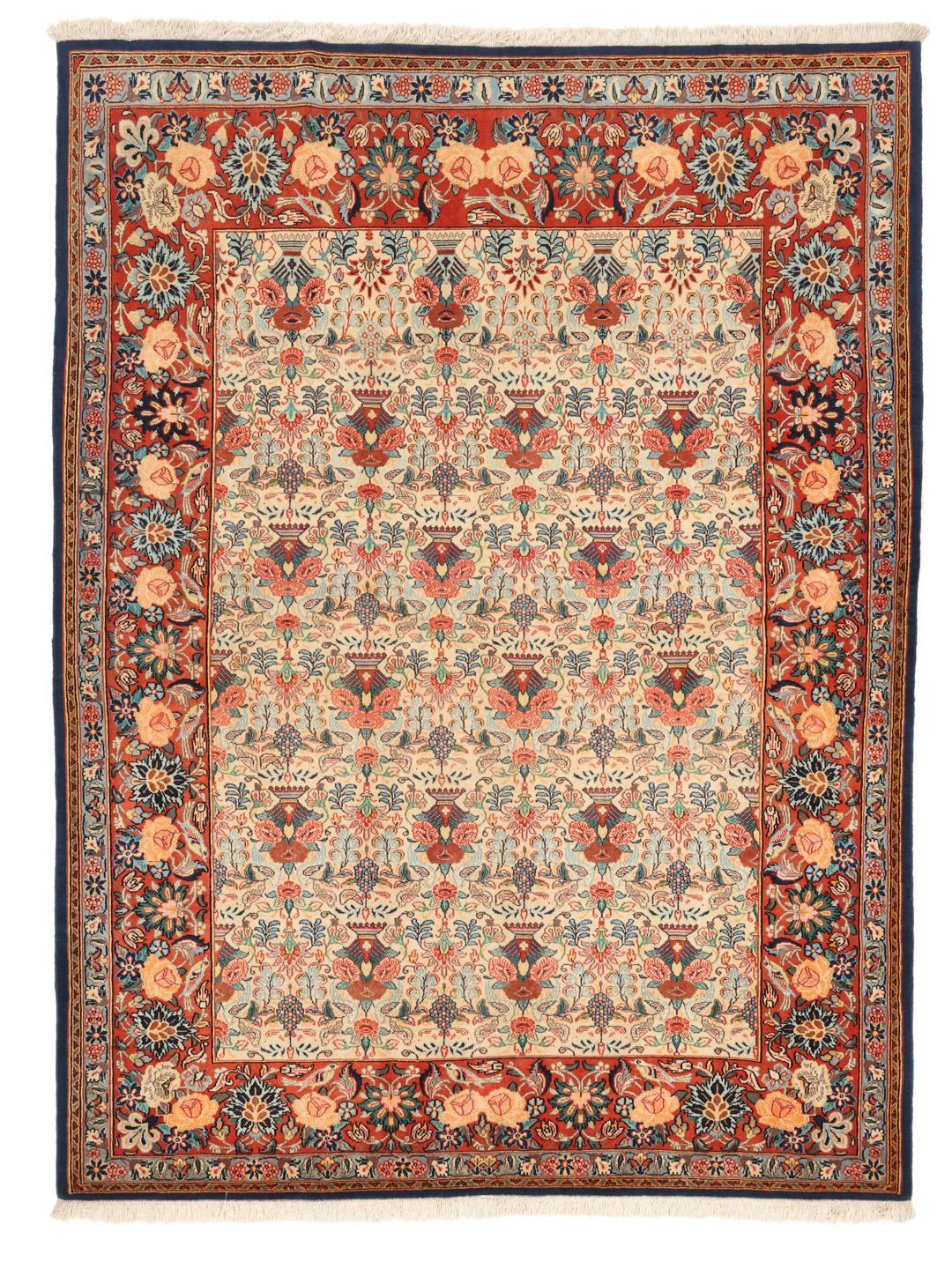 Hand-knotted Varamin rug with intricate floral patterns in red and beige from the Middle East