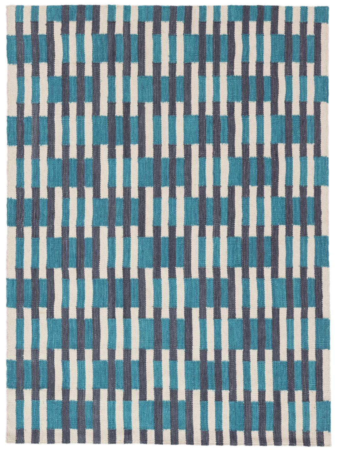 blue rug with a woven geometric pattern