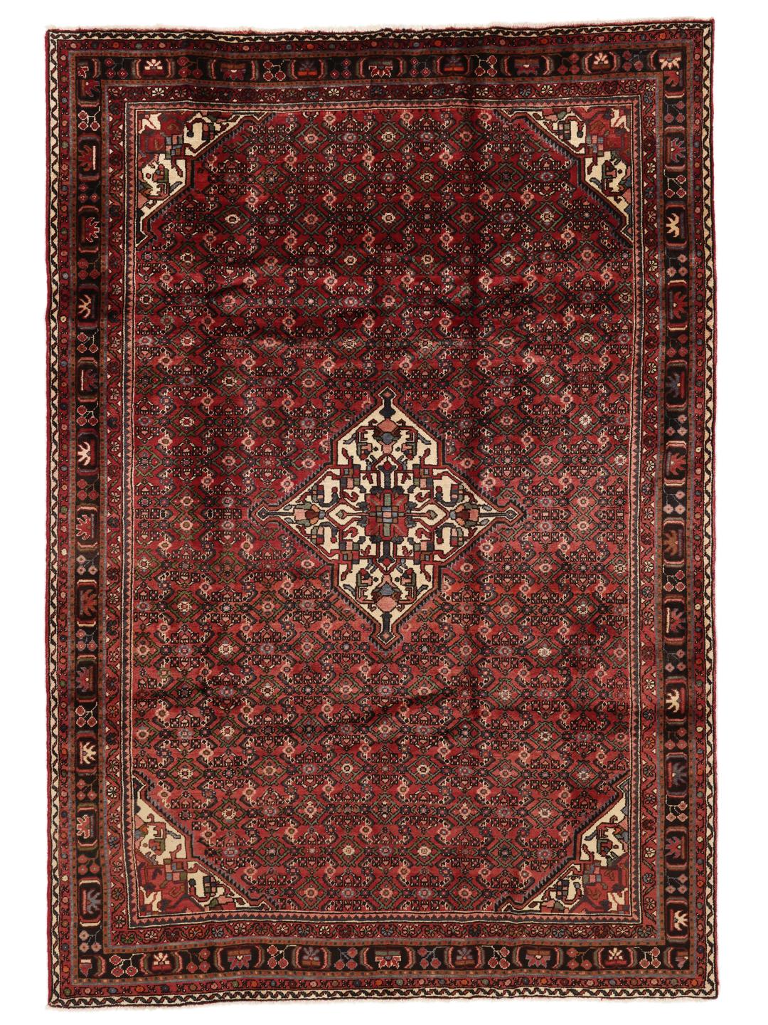 Hand-knotted Hosseinabad rug from the Middle East in deep red tones