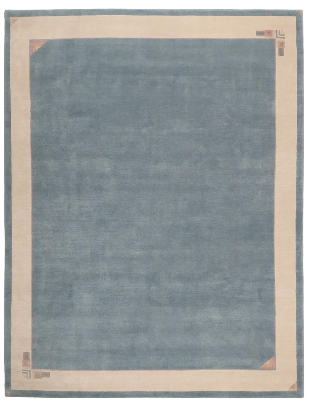 Handgeknoopt blauw wollen tapijt uit Nepal met een minimalistisch randontwerp