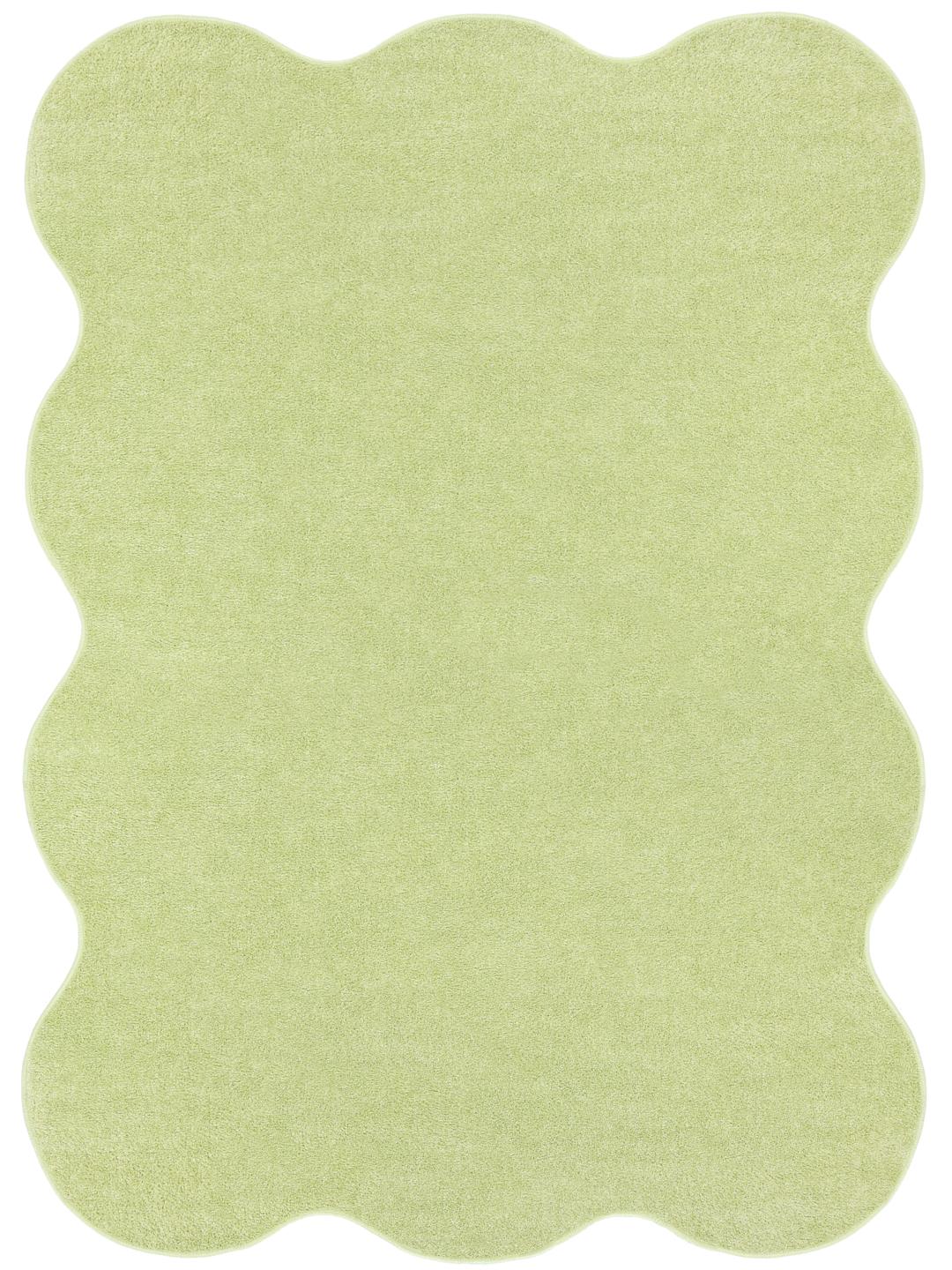 Groen vloerkleed met een onregelmatige vorm