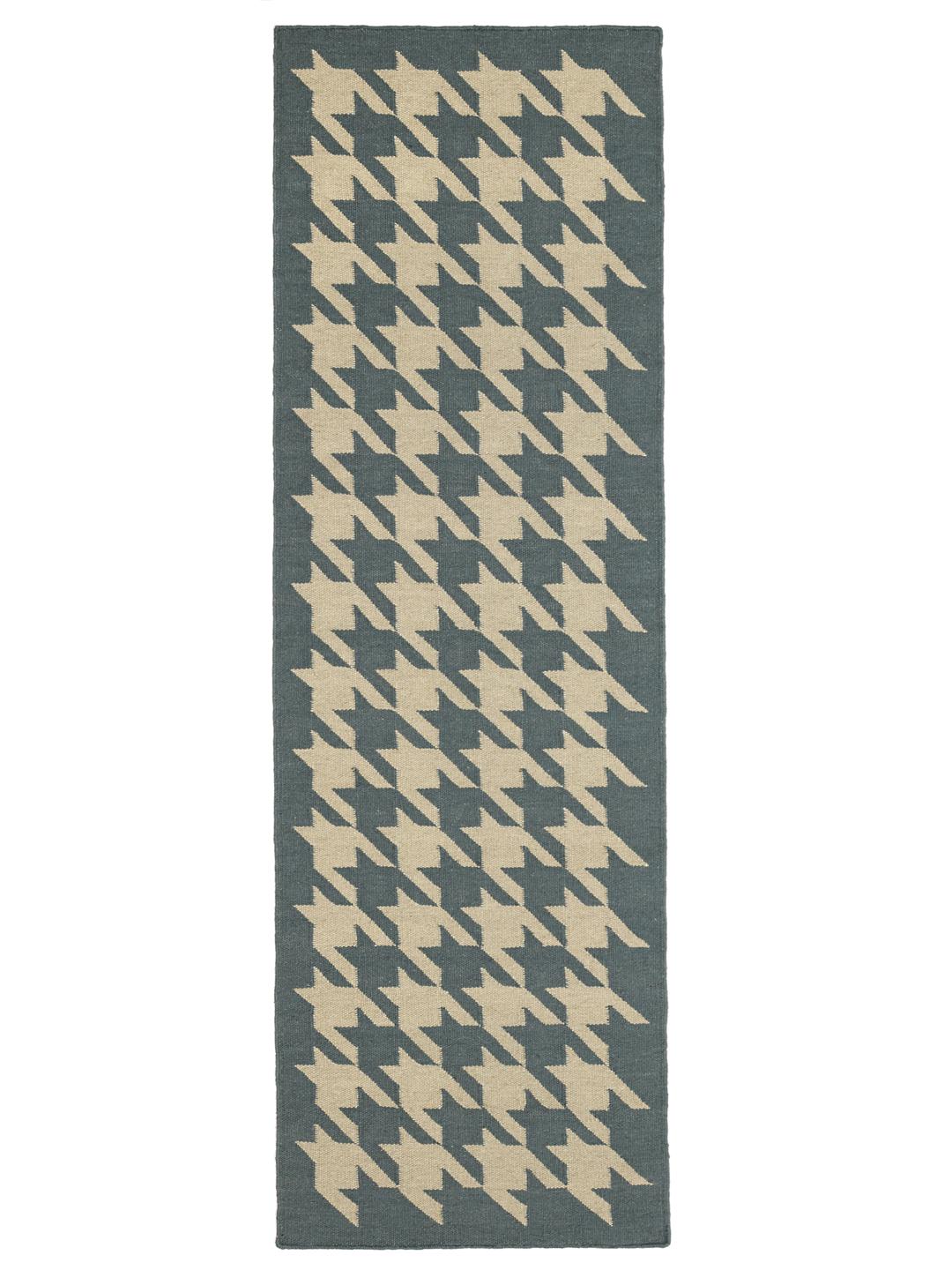 Een blauw en beige loper met houndstooth-patroon