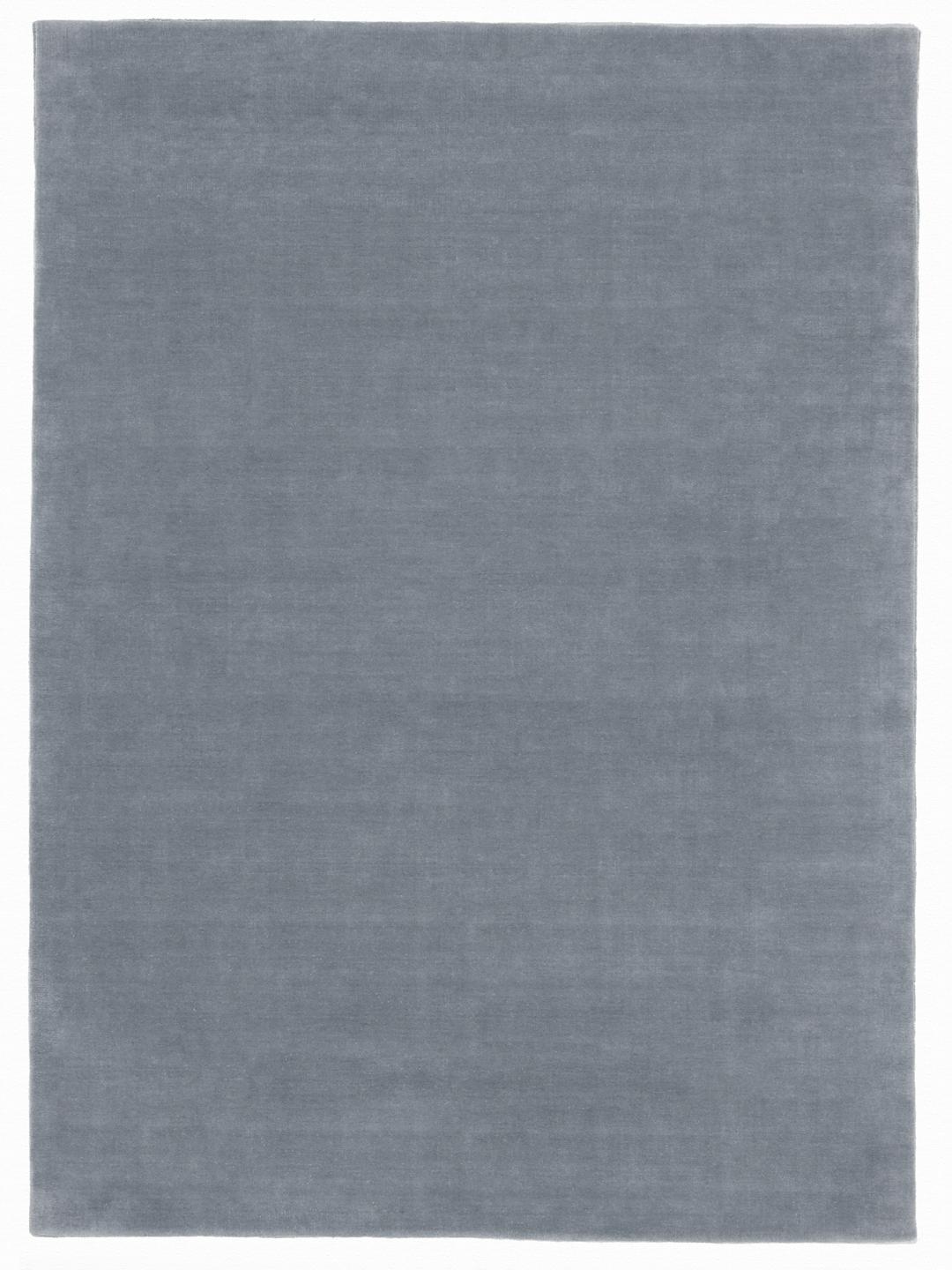 Blauw tapijt met een zachte pooltextuur