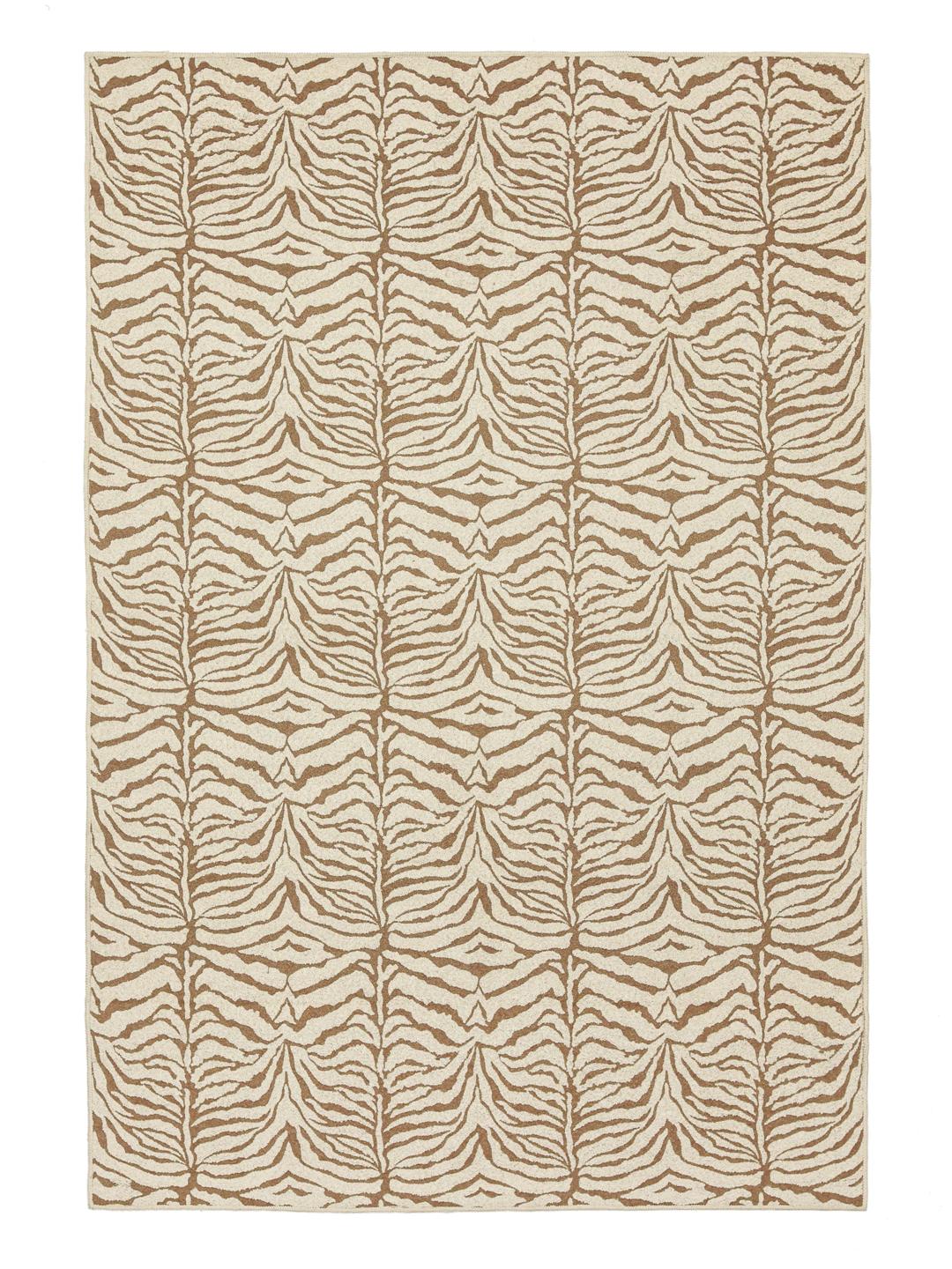 Un tapis marron et blanc avec un motif organique