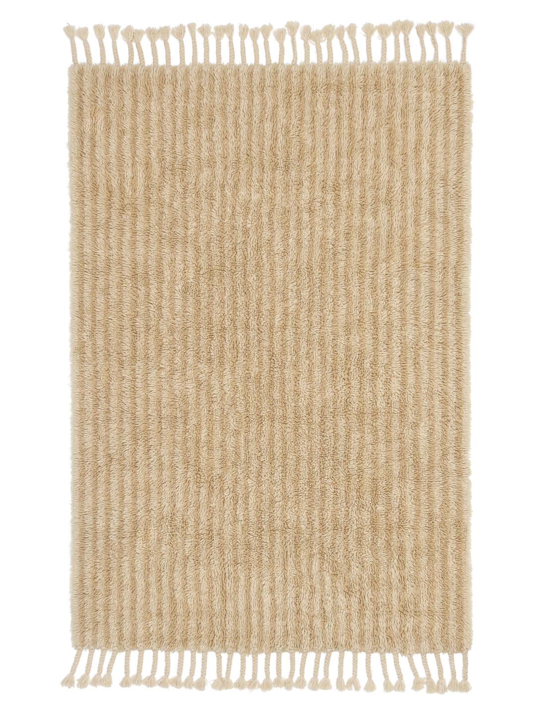 Beige tapijt met geribbelde textuur en franjes