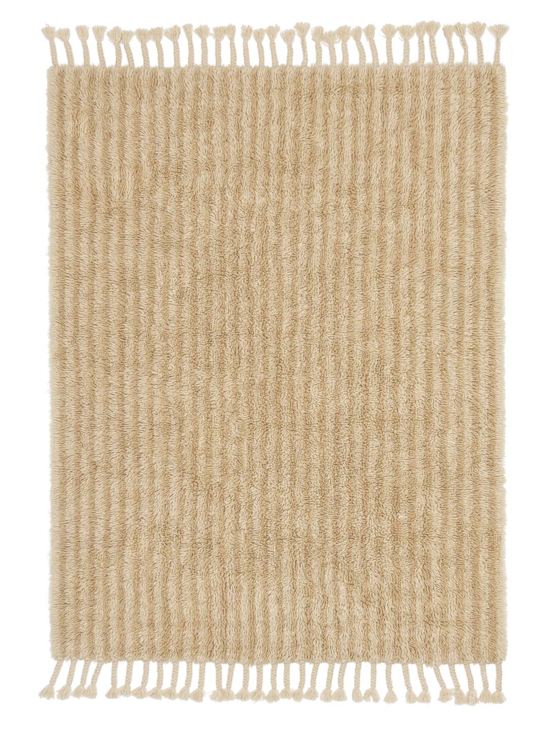 Beige tæppe med riflet tekstur og frynser