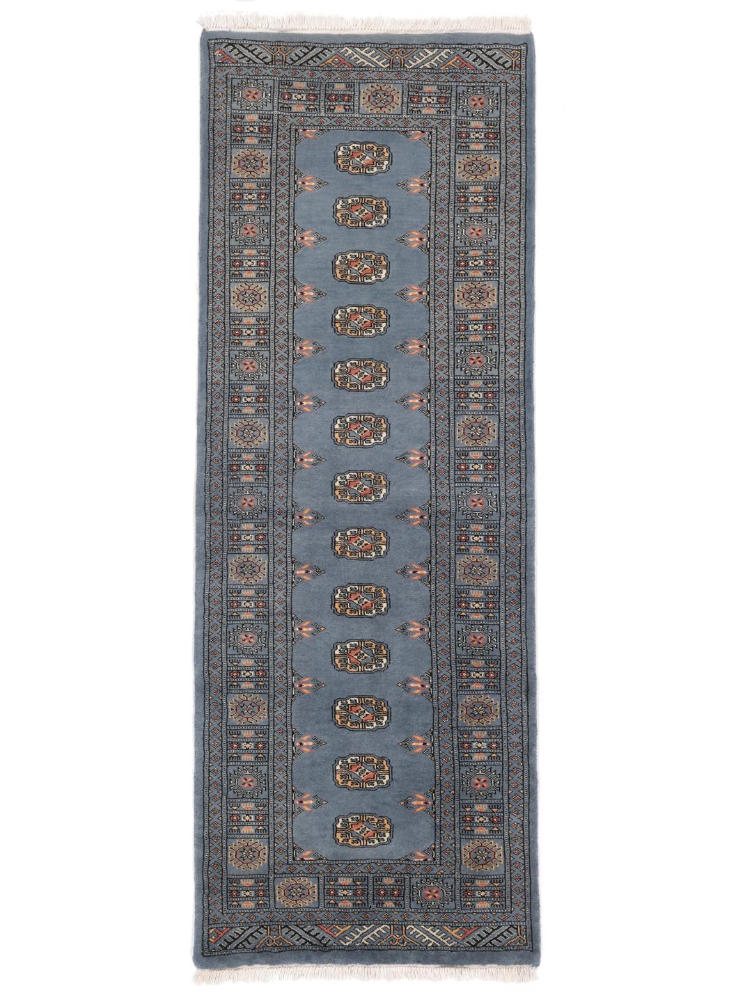 Hand-knotted Pakistan Bokhara runner rug in blue with traditional geometric motifs