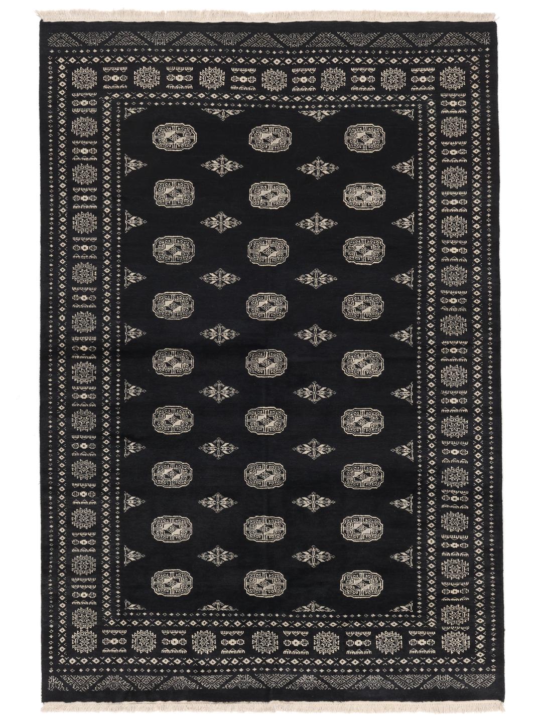 A hand-knotted black Pakistan Bokhara rug with traditional geometric motifs.