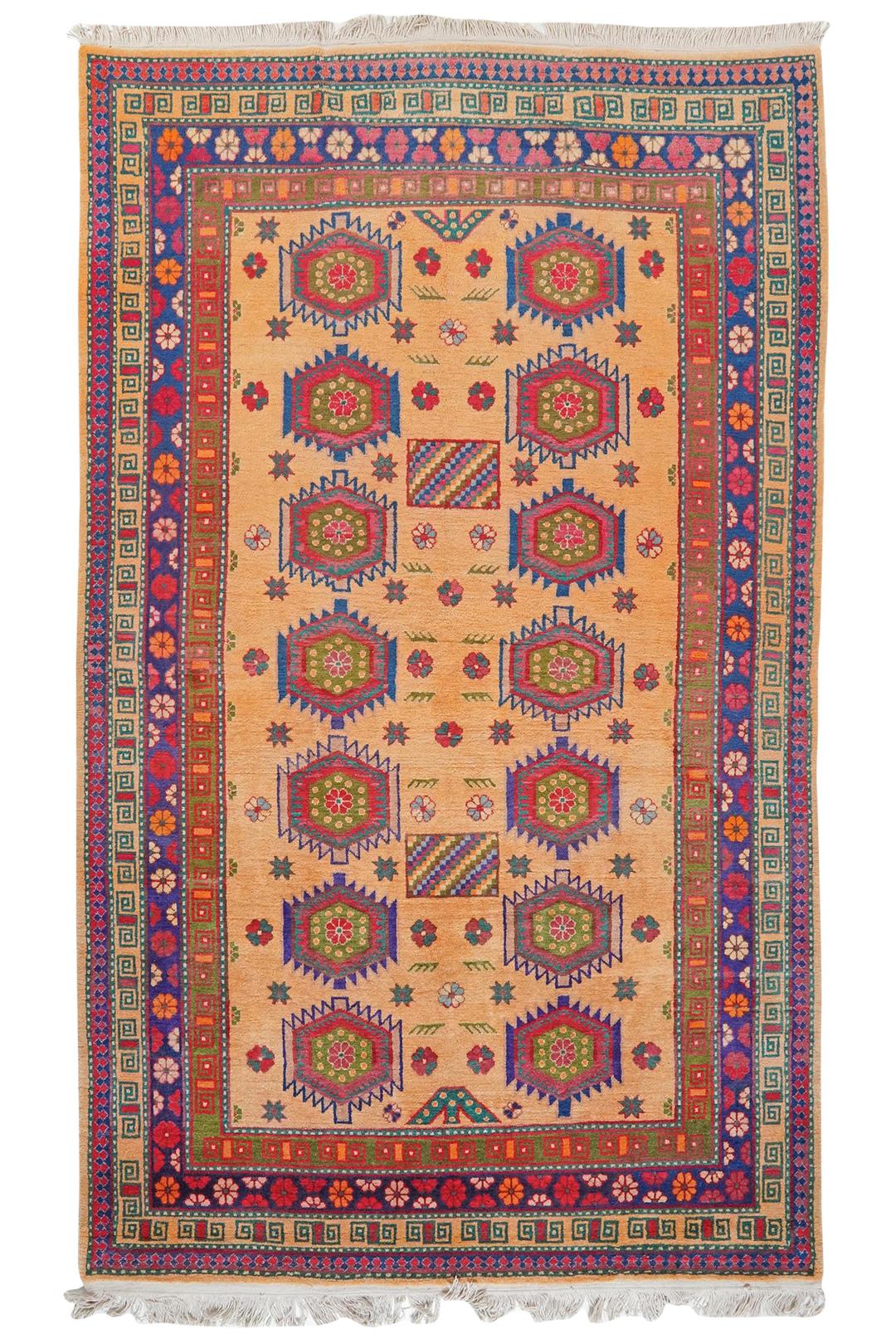 Antique Samarkand rug from China with a beige field and geometric medallions