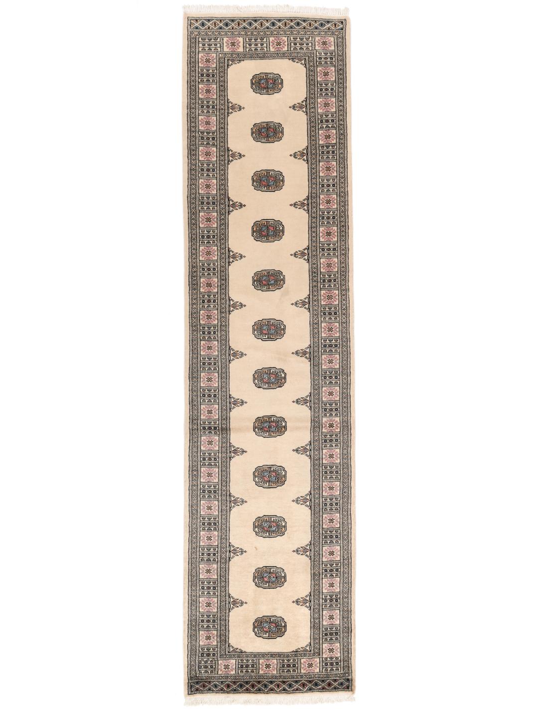 Hand-knotted beige runner rug from Pakistan with a traditional repeating medallion pattern