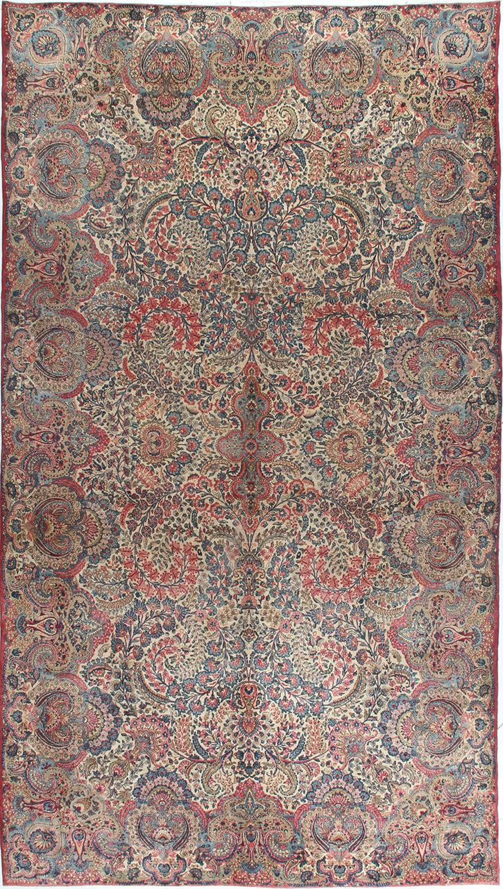 Handmade rug from Persia in beige and dark-red