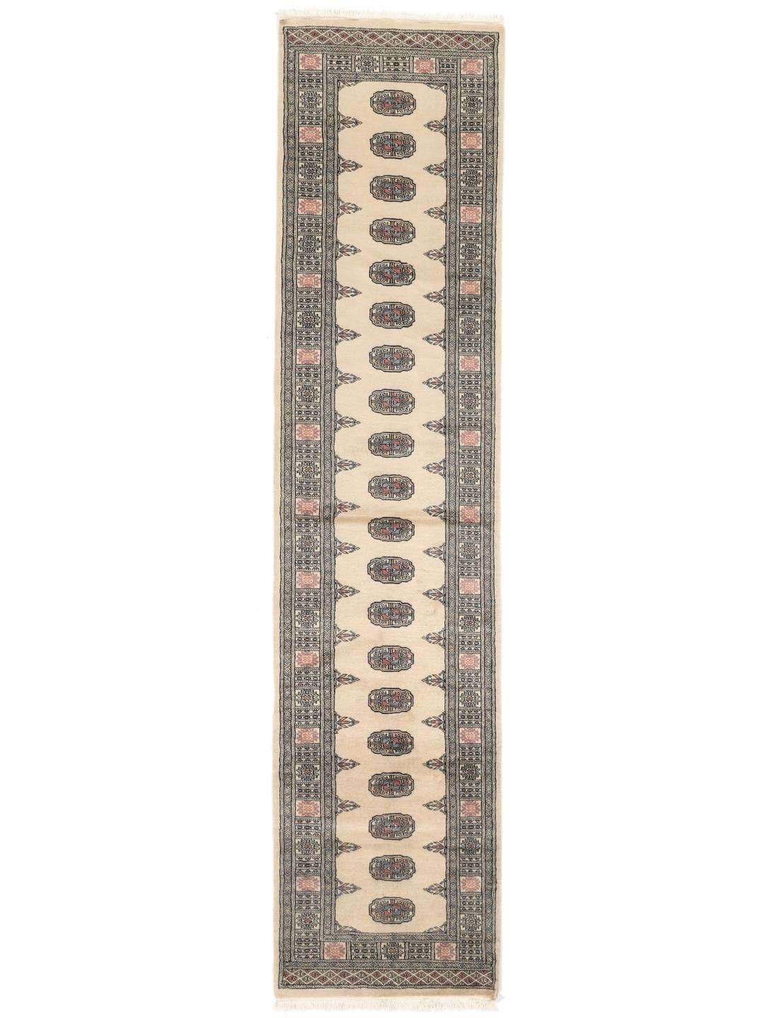 Hand-knotted Pakistan Bokhara runner with beige field and medallion patterns