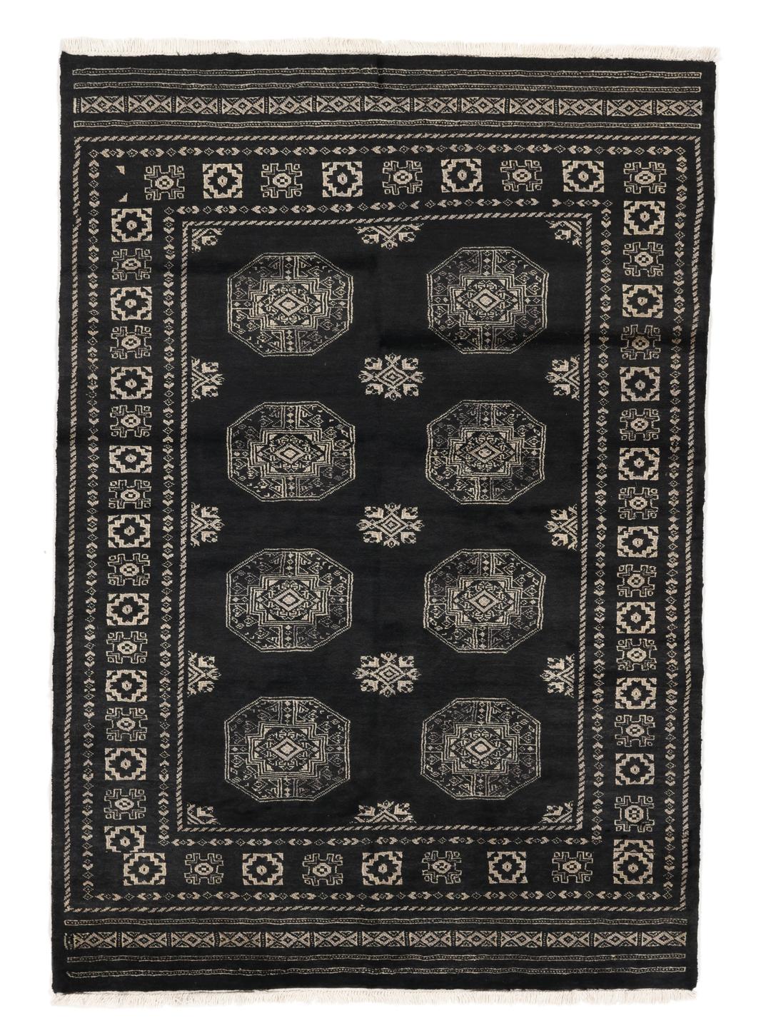 A hand-knotted Pakistan Bokhara rug with a dark field and geometric motifs.