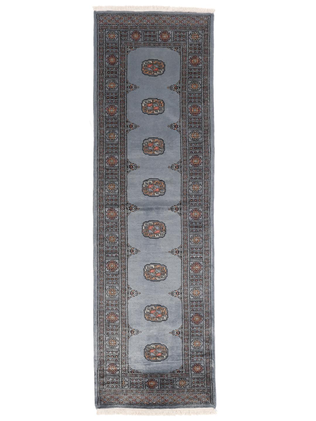 Hand-knotted Pakistan Bokhara runner in blue with traditional motifs
