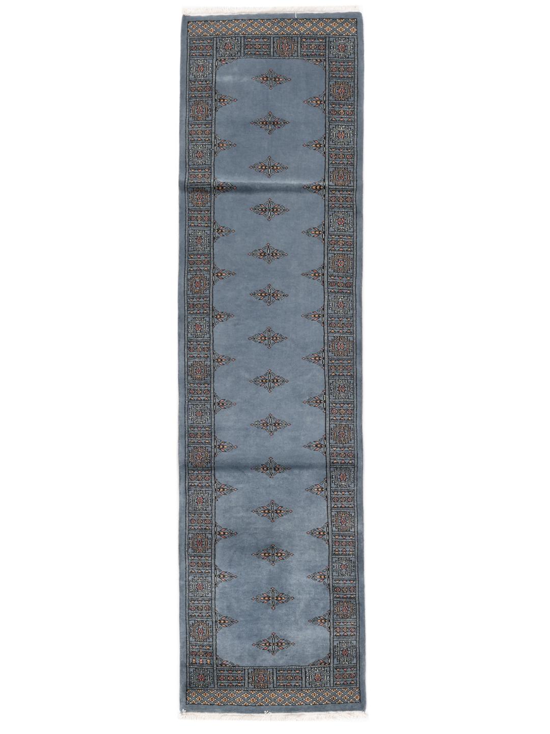 Hand-knotted runner rug from Pakistan in a soft blue colour