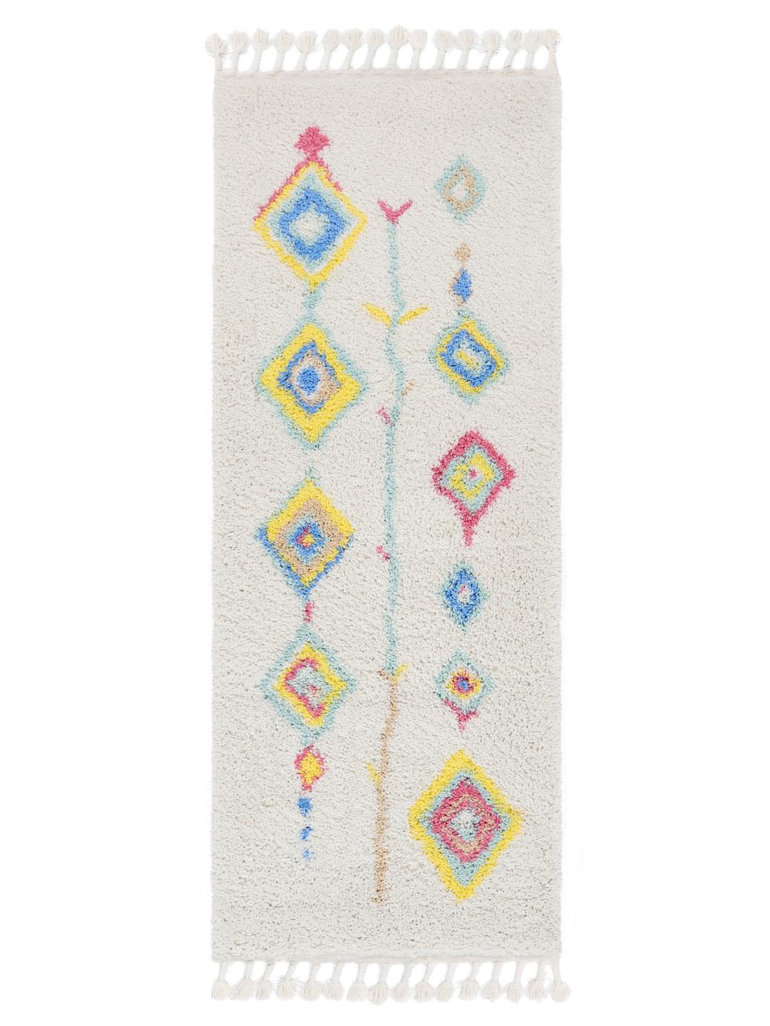 Een wit loper-tapijt met kleurrijke geometrische patronen en decoratieve franjes