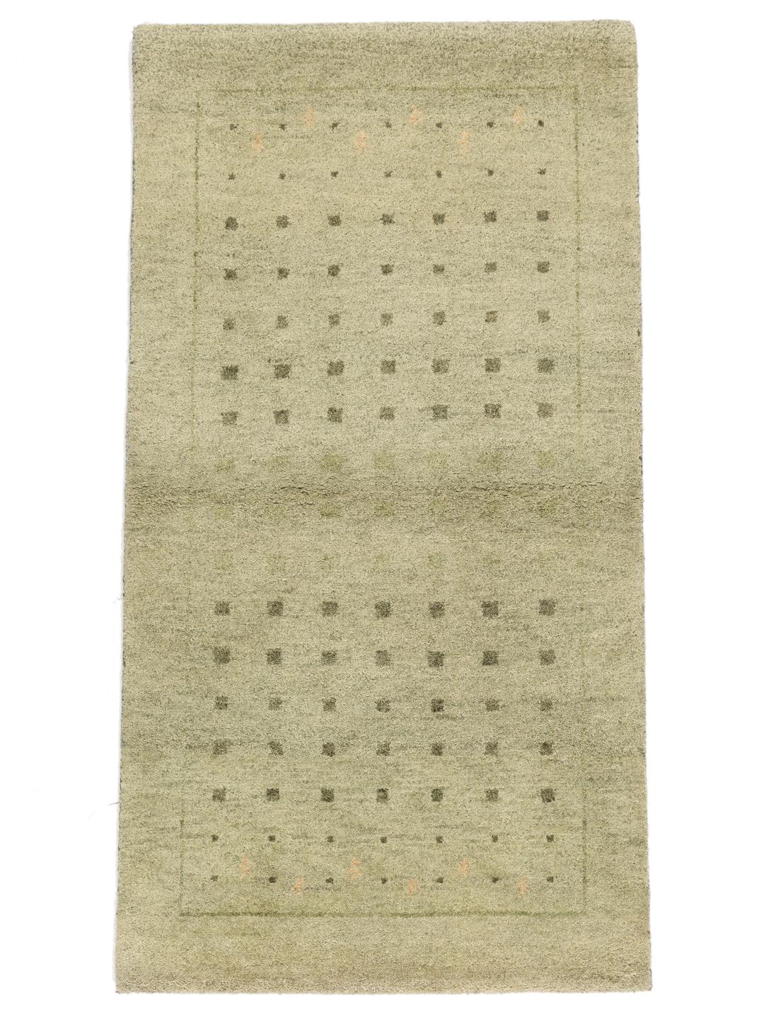 Hand-knotted Gabbeh rug from India in a soft light-green shade