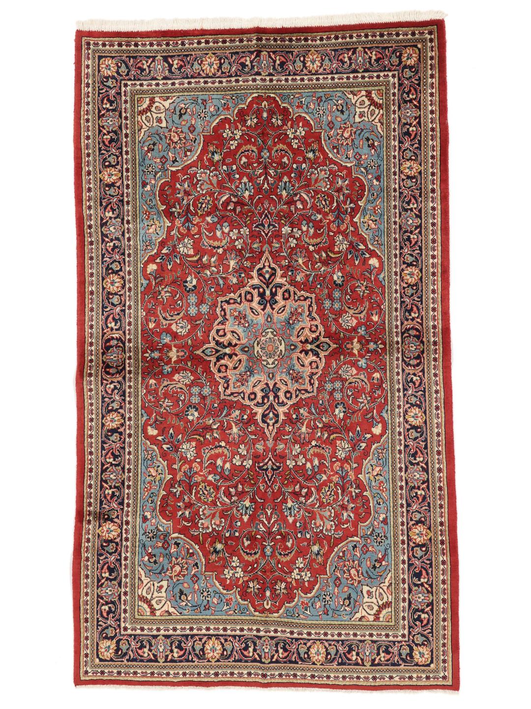 Hand-knotted Sarough rug from the Middle East with a red and blue floral pattern.