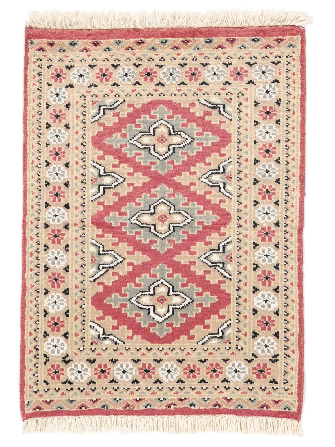 Hand-knotted Pakistan Bokhara rug featuring red and beige geometric patterns.