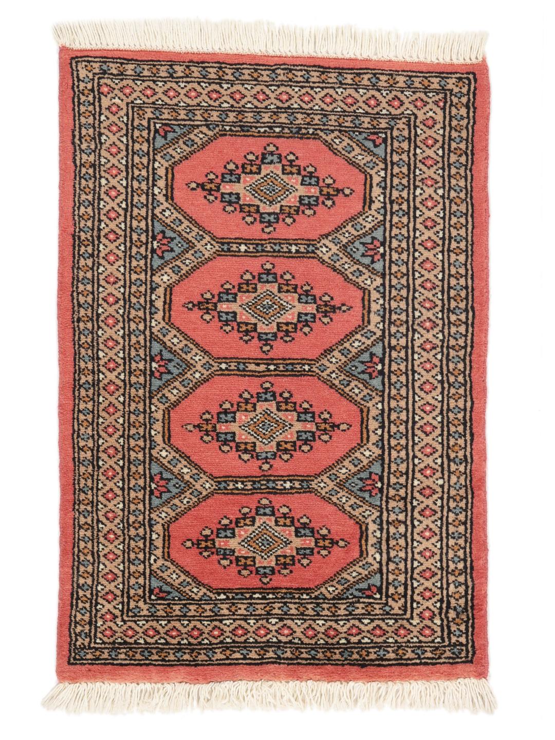 A hand-knotted Pakistan Bokhara rug with a red field and traditional medallion patterns.