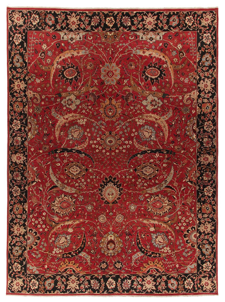Alfombra tejida a mano de la India con un diseño floral rojo