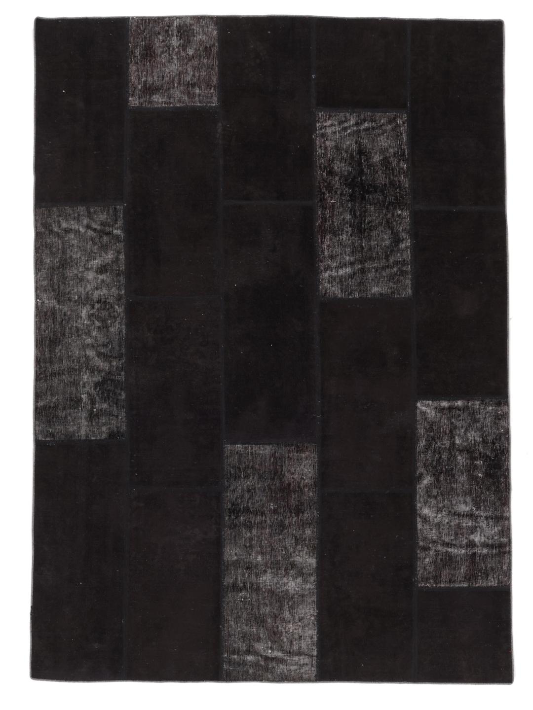 Hand-knotted patchwork rug from the Middle East in black
