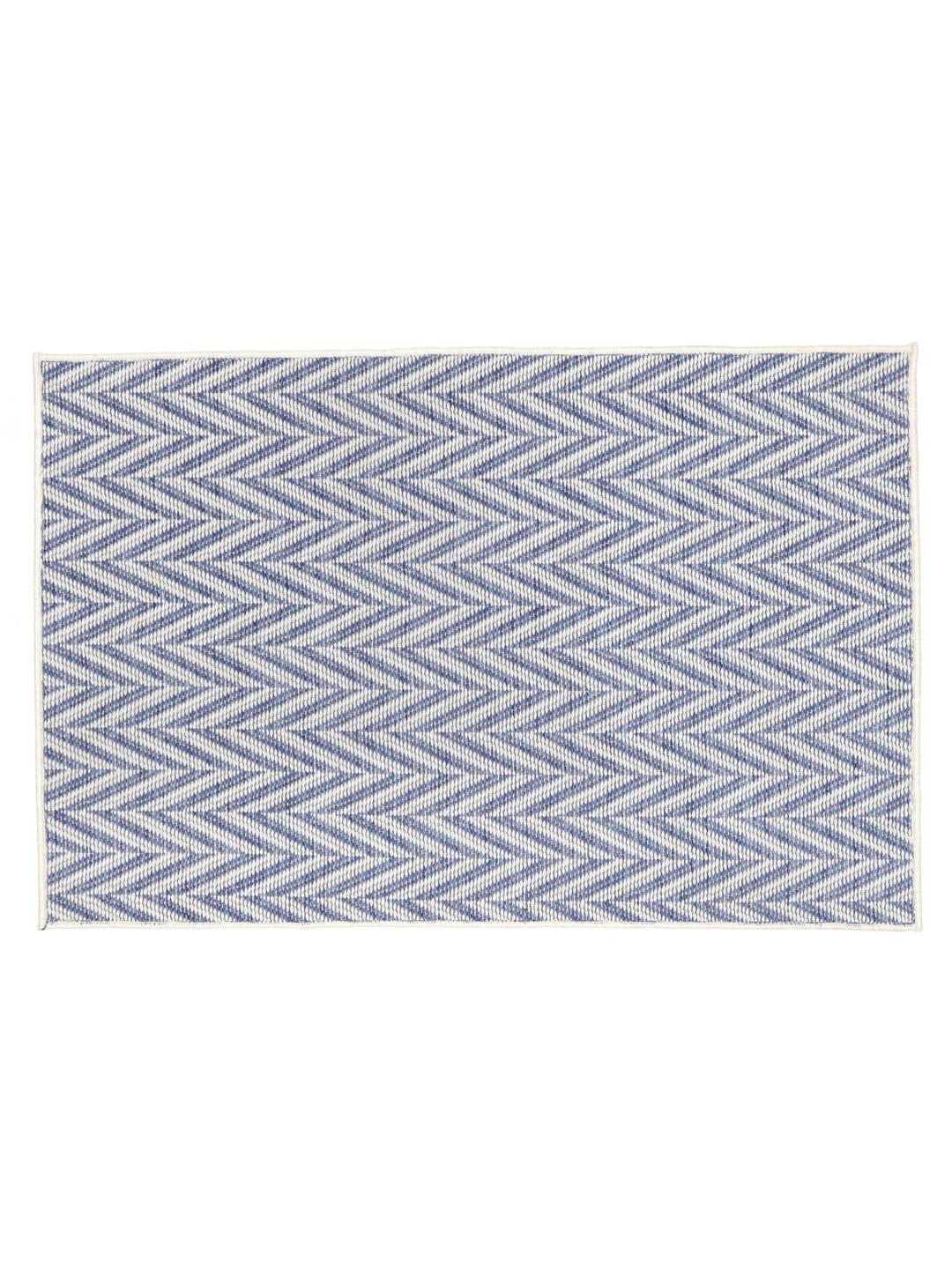 blauwe deurmat met een zigzagpatroon