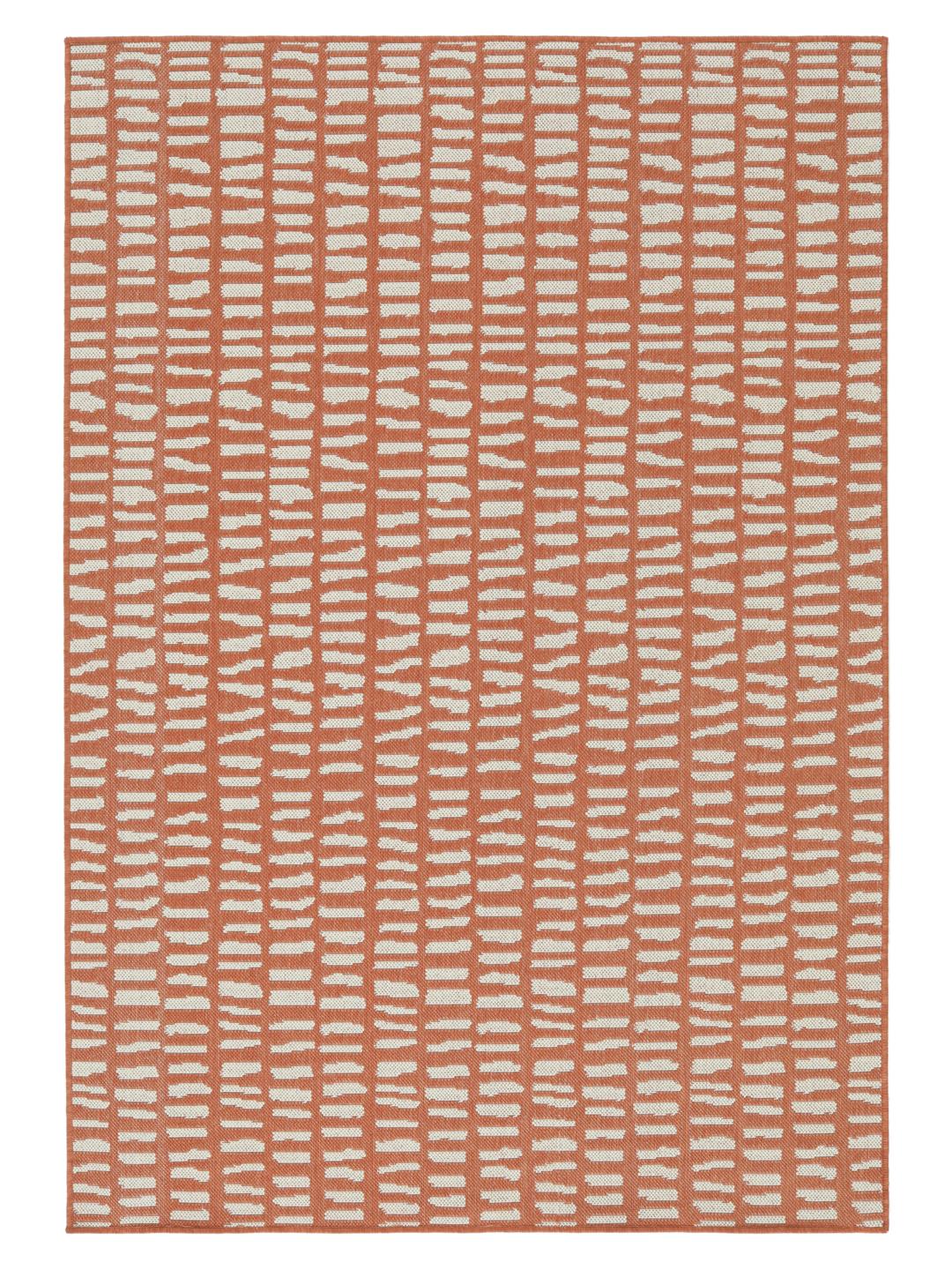 Rødt tæppe med mønstret design